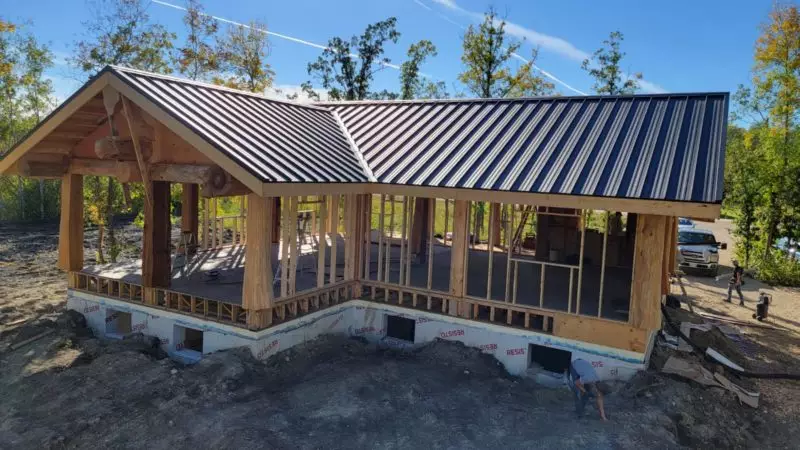 a new house with a construction worker